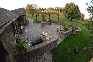 Patio - backyard concrete paver patio idea in Other