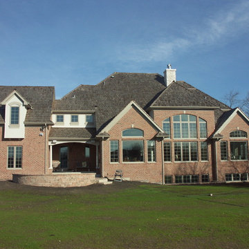 Large Brick Traditional with Wall of Windows