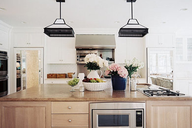 Inspiration for a mid-sized transitional kitchen remodel in Other with shaker cabinets, white cabinets, granite countertops, white backsplash and mosaic tile backsplash