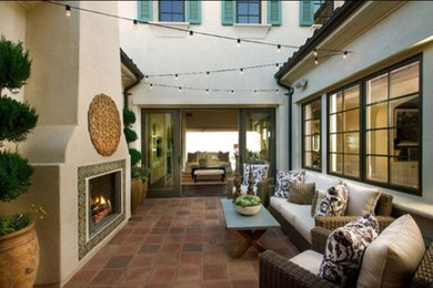 Tuscan patio photo in San Diego