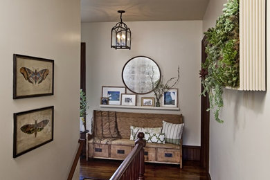 Farmhouse dark wood floor hallway photo in Detroit with white walls