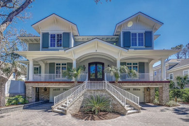 Example of a large transitional gray three-story mixed siding gable roof design in Atlanta