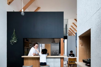 Design ideas for an industrial vestibule in Kobe with white walls, concrete floors, a sliding front door, a light wood front door, grey floor, wallpaper and panelled walls.
