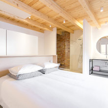 Casas Houzz: Un ático de techos altos y materiales en 'crudo'