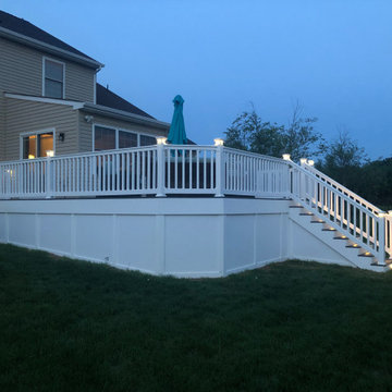 Composite Deck, Sod, Low Voltage Lighting, Playground, and Back Yard Renovation