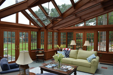 Example of a country family room design in Other