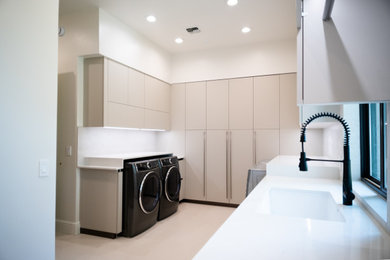 Minimalist laundry room photo in Phoenix
