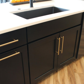 Angled Kitchen Design with Slab Style Cabinets in Pecan Stain