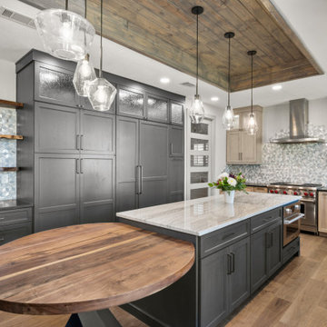 Open Concept Kitchen with Charcoal Cabinetry and Wood Ceiling Inset