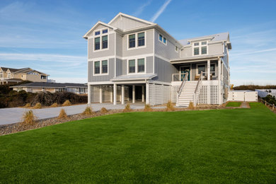 Coastal exterior home idea in Other