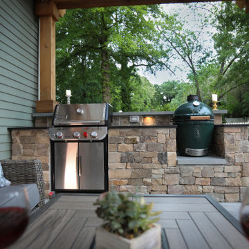 Cozy Covered Patio with Stone Outdoor Kitchen & Grill Station