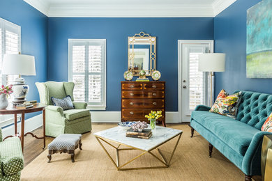 Mid-sized transitional enclosed living room photo in Atlanta with blue walls