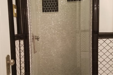 Example of a mid-sized ornate black and white tile and porcelain tile marble floor bathroom design in Austin with a two-piece toilet, white walls and a pedestal sink
