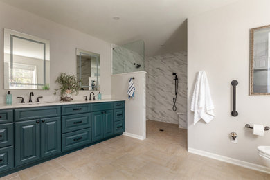 Large transitional master white tile and porcelain tile porcelain tile, beige floor and double-sink bathroom photo in Columbus with raised-panel cabinets, green cabinets, white walls, an undermount sink, quartz countertops, beige countertops and a built-in vanity