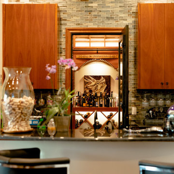 View of the North Dallas Residential Custom Wine Cellar from the Bar Area