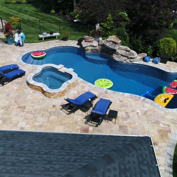 Ella (Scabos) Travertine Paver and Silver Travertine Pool Coping Project