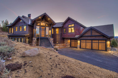 Huge transitional multicolored two-story mixed siding house exterior idea in Other with a shingle roof