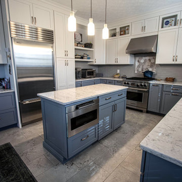 Two Tone Medallion White and Blue Kitchen with Gray Backsplash