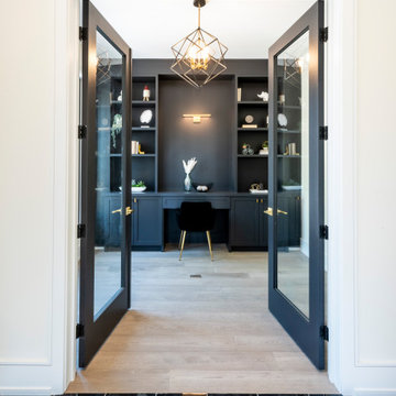 Beautiful custom office with black built-ins