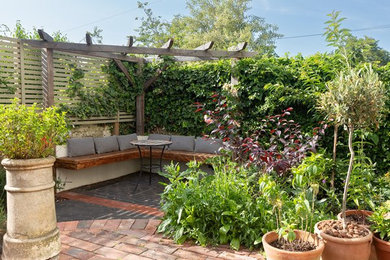 Design ideas for a traditional patio in Sussex.