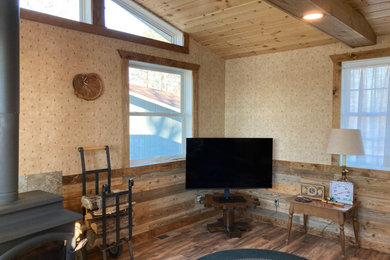 Inspiration for a mid-sized rustic wood wall family room remodel in Miami