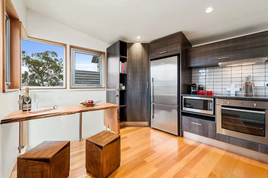 This is an example of a contemporary kitchen in Hobart.