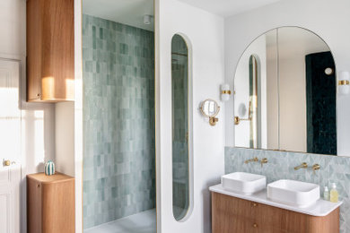 Large contemporary master bathroom in Paris with brown cabinets, a drop-in tub, a corner shower, green tile, mosaic tile, white walls, a drop-in sink, white benchtops, a double vanity and a freestanding vanity.