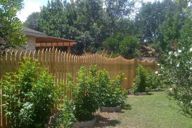 Design ideas for a traditional full sun backyard formal garden in Orange County.