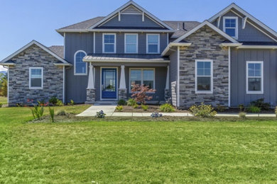 Example of an arts and crafts exterior home design in Other