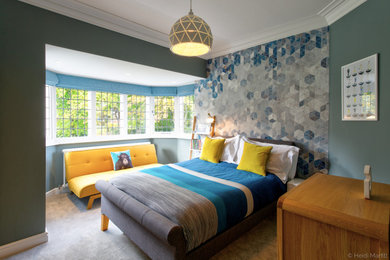 This is an example of a contemporary bedroom in Other with grey walls, carpet and grey floor.