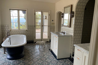 Elegant master white tile and ceramic tile ceramic tile and white floor bathroom photo in Los Angeles