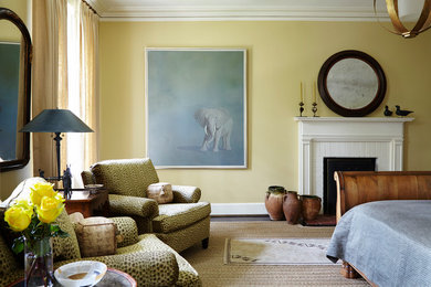 Inspiration for a transitional master dark wood floor bedroom remodel in Atlanta with yellow walls