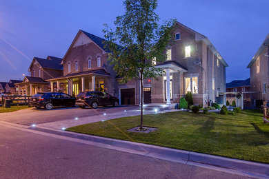 Example of a trendy exterior home design in Toronto