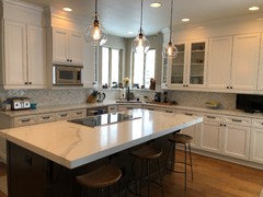 New white quartz countertops/backsplash. Help with Cabinet Color!