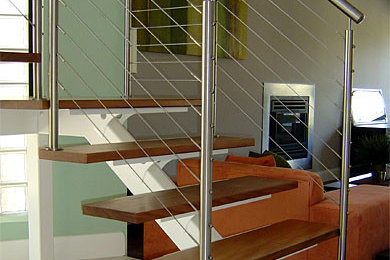 Exemple d'un petit escalier droit moderne avec des marches en bois.