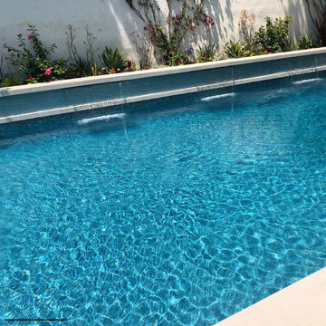 Pacific Palisades - Contemporary Rectangular Swimming Pool with Spa and Window
