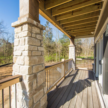 Two Story Stone Home with Great Outdoor Living Space