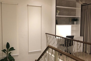 Inspiration for a large cottage wooden u-shaped metal railing staircase remodel in Other with concrete risers