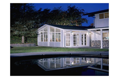 This is an example of a mid-sized traditional sunroom in Sacramento with no fireplace and a standard ceiling.