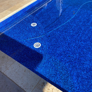 Polymer vinyl liner pool w/concrete spillover spa & automatic pool cover