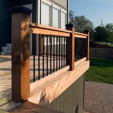 Smith - Cedar deck in Kansas City with stamped concrete patio.