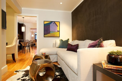 Example of a small transitional built-in desk light wood floor study room design in Boston with gray walls