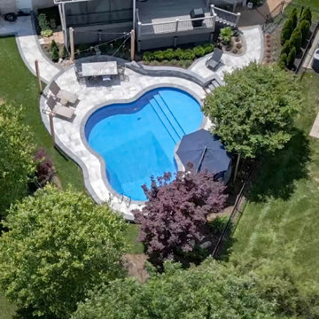 Pool Oasis with Hardscaping Features