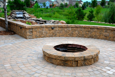 Example of a tuscan patio design in Minneapolis