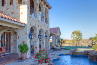 Inspiration for a mediterranean pool remodel in Dallas