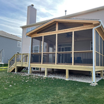 Screen Porch with a Cathedral Ceiling & Gable Roof with a Wood Deck in Wauconda