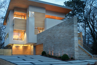 Design ideas for a large modern front yard concrete paver driveway in Atlanta.