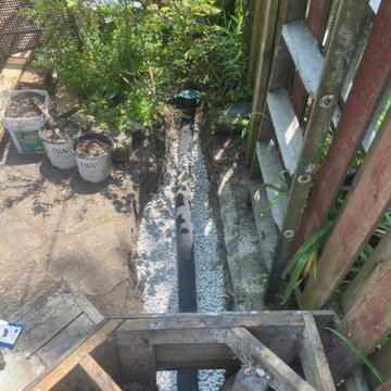 New hardscape stone paver pathway with drain installation