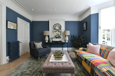 Victorian living room in London with blue walls.