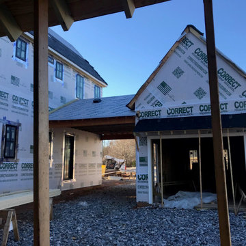 PROGRESS PHOTO: Courtyard entrance with single car garage & porte cochere